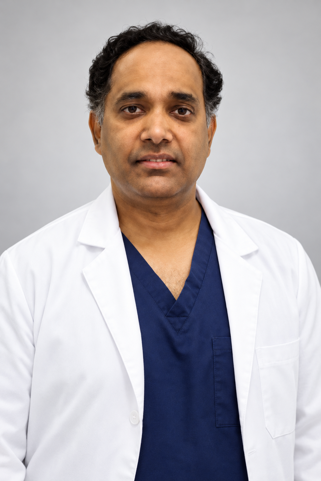 Dr. Srikanth Mahavadi in a white coat